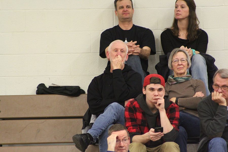 Norm Lichte analyzes home railer boys basketball game. “[I still go because of] the enjoyment I get from it. I’m having fun,” Lichte said.