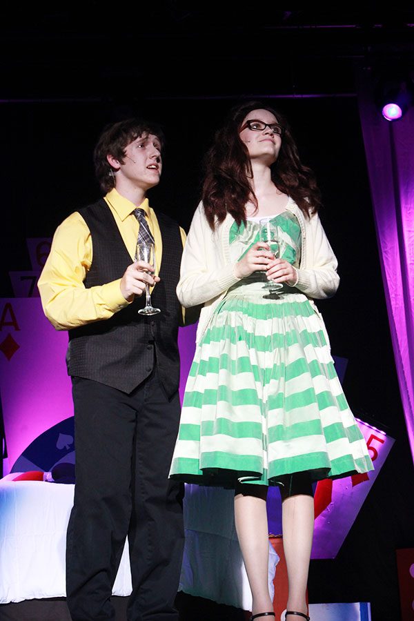 Freshman Rai Angelo serenades sophomore Hannah Teater on Apr. 5 during the dress rehearsal on Lucky Stiff. Their characters start out rivals, but eventually fall in love.
