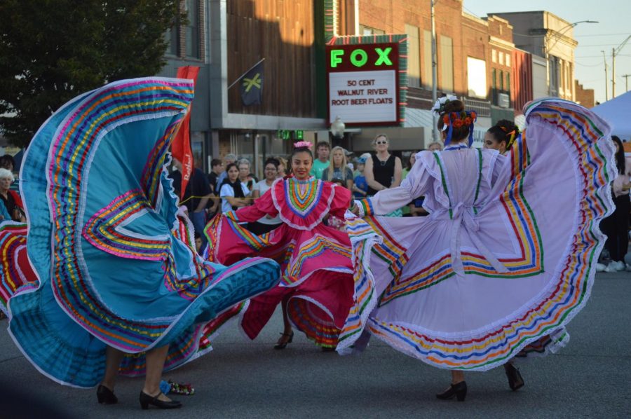 Sophomore Salma Chavez dances while the dancers beside her twirl their skirts. The dance they performed was from a region of Mexico called Jalisco. 