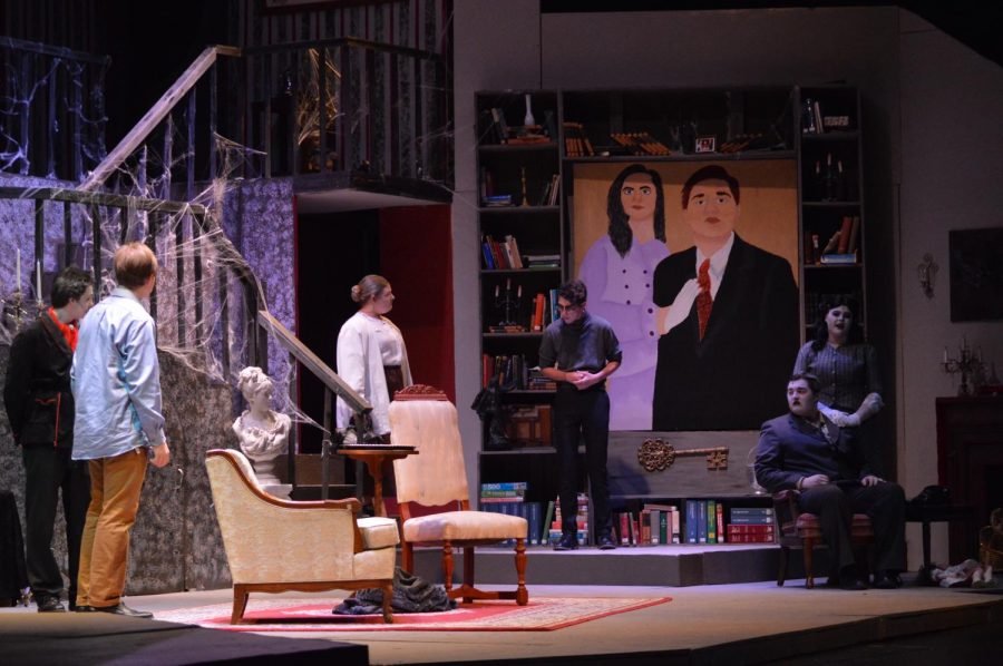 Members of the  cast perform a scene onstage. The show was based on an Edgar Allen Poe story.