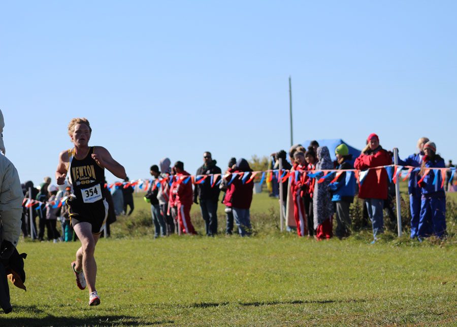 Junior Jonah Hodge runs the last stretch of the race. This will be Hodges third trip to state.