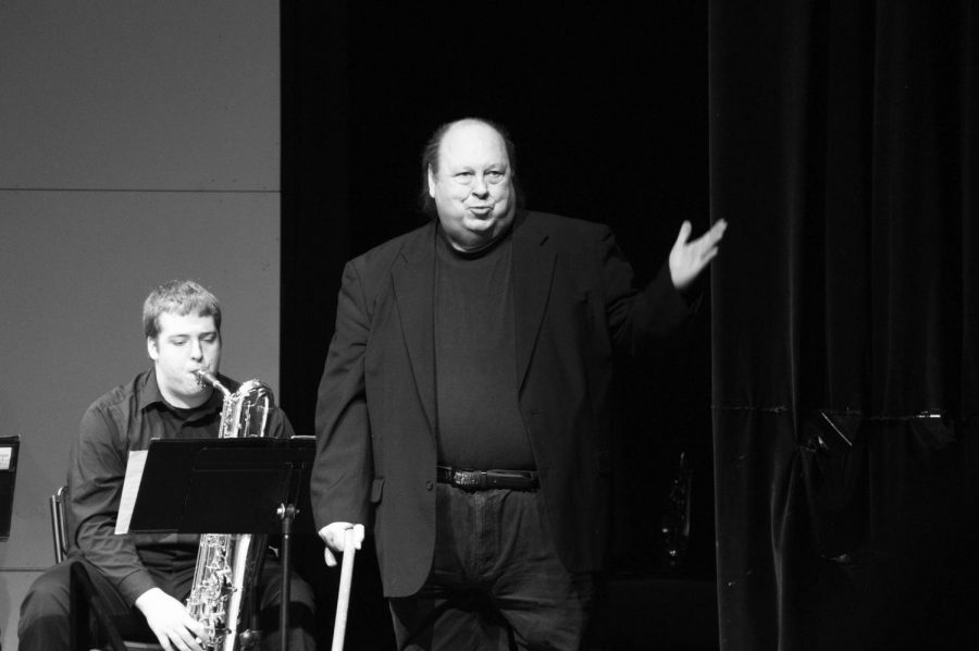 Woolery speaks at the beginning of  a Jazz concert in March 2017. 