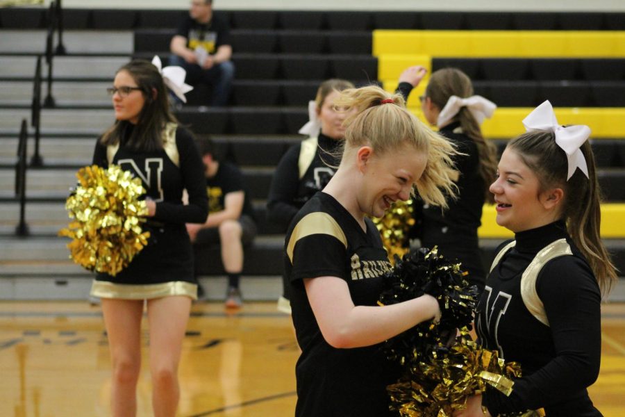 Sisterly love, senior Allyssa Meyer shares a laugh with her sister, sophomore Becca Meyer. 