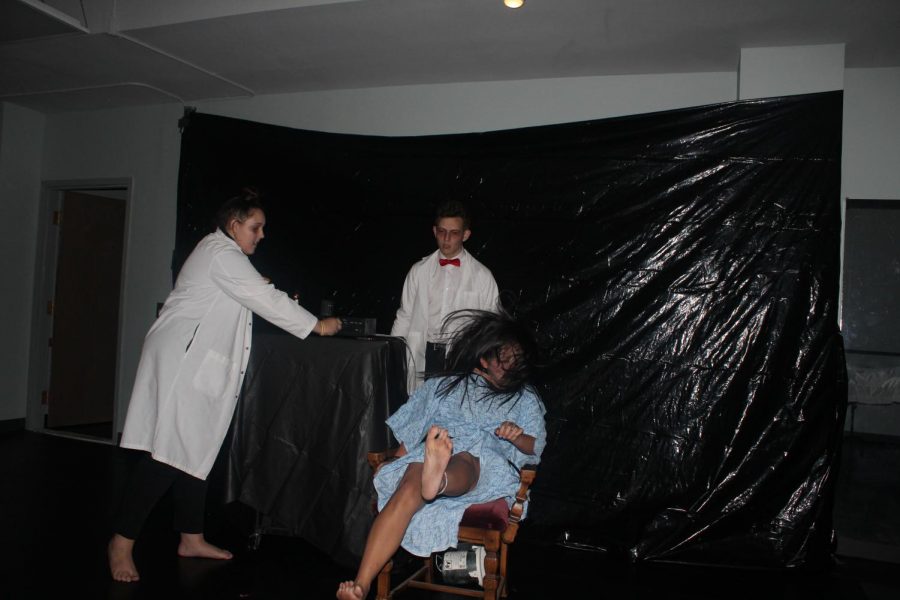 Kayla Wong plays a patient that is electrocuted by Sophomore Abi Boese and David Kliewer who performed as electric chair technicians. 
