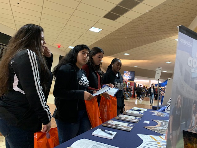 Students from Newtons JAGK program visit a booth at the ESSDACK Career Expo.
