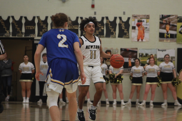 Senior Jaheem Ray brings the ball up the court. 