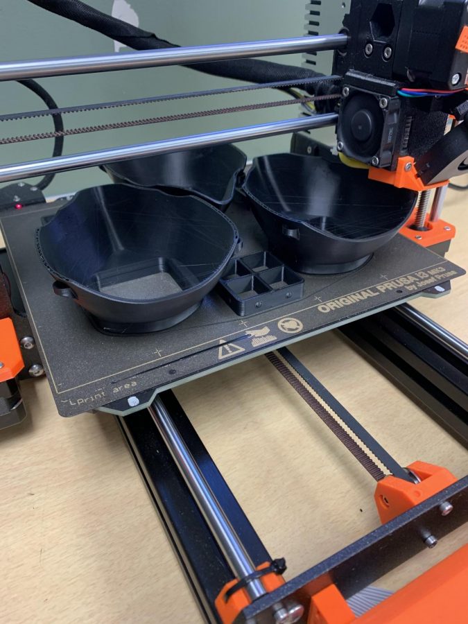 New, protective masks sit after being created by member of the Robotics team. They wanted to create the masks with their 3D printer to help supply local healthcare workers with protective equipment.