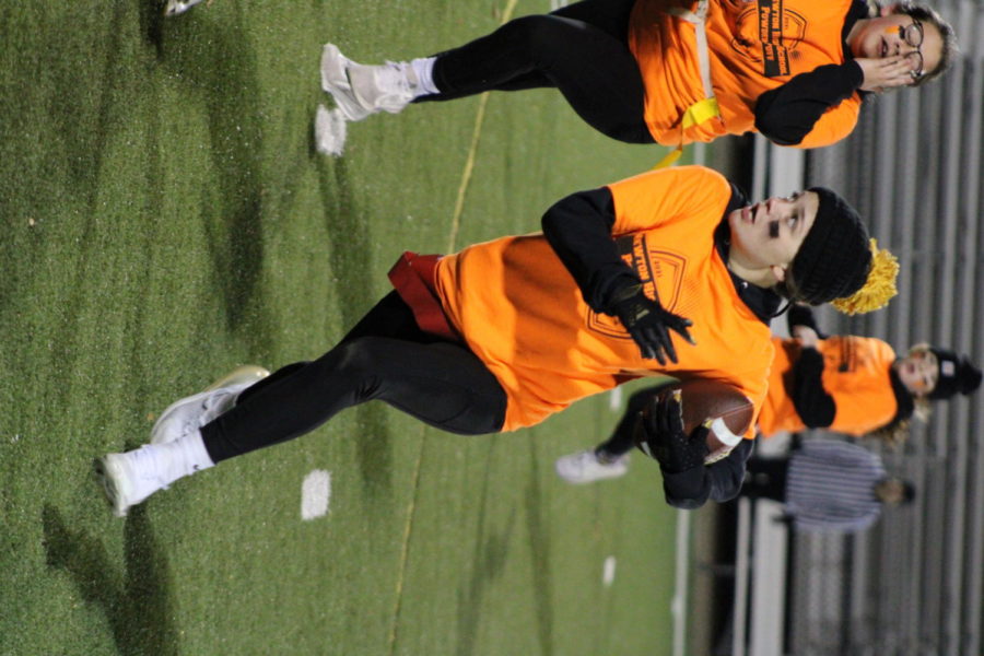 Sophomore Emma Huntley sprints past the Sophomore defense during the Powderpuff tournament on Nov. 12.