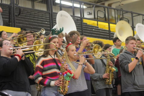 Band plays songs as students enter the gym to start the pep assembly off.