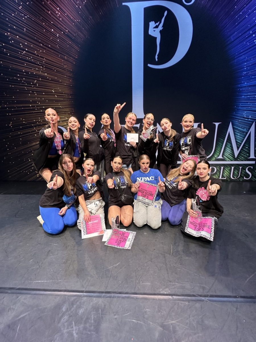 Diamond Company members celebrate the final dance competition of the year with a first-place win.