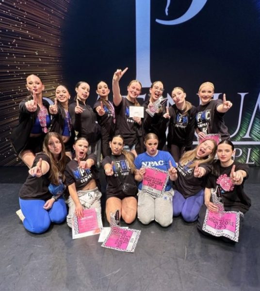 Diamond Company members celebrate the final dance competition of the year with a first-place win.