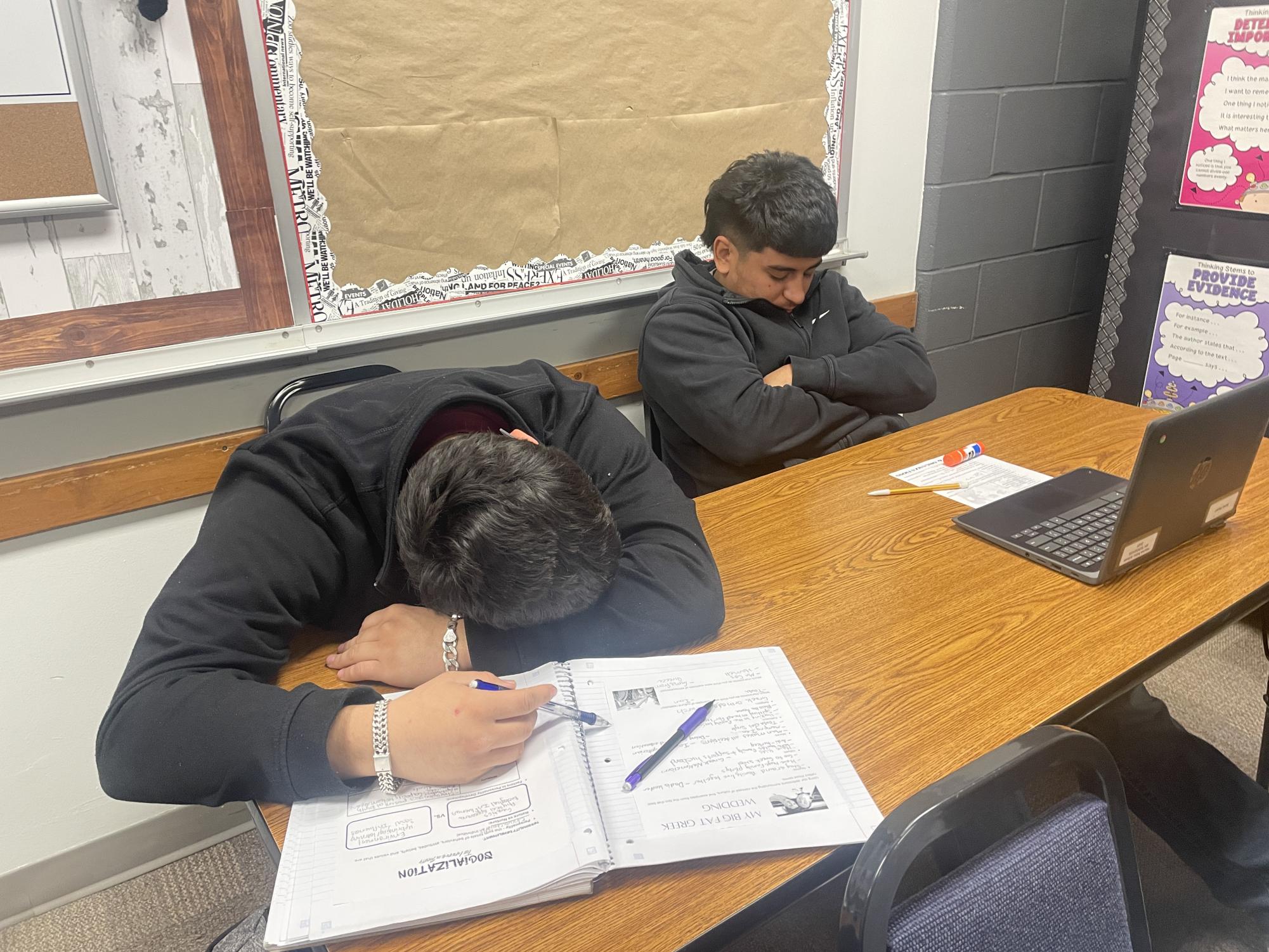 Seniors Edgar Garcia and Royser Duran sleep through Sociology class.